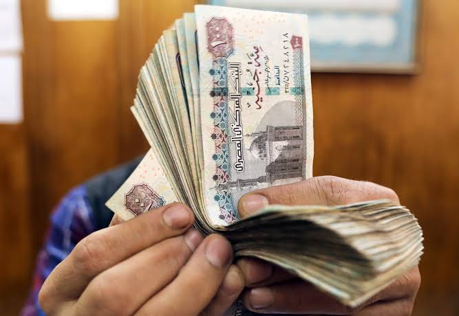 EGYPTIAN POUND HITS RECORD LOW OF 56 TO THE DOLLAR AS REGIONAL TENSIONS RATTLE MARKETS